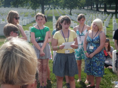 Mona Shores student Maddie Myhre reading a poem she wrote to Eric